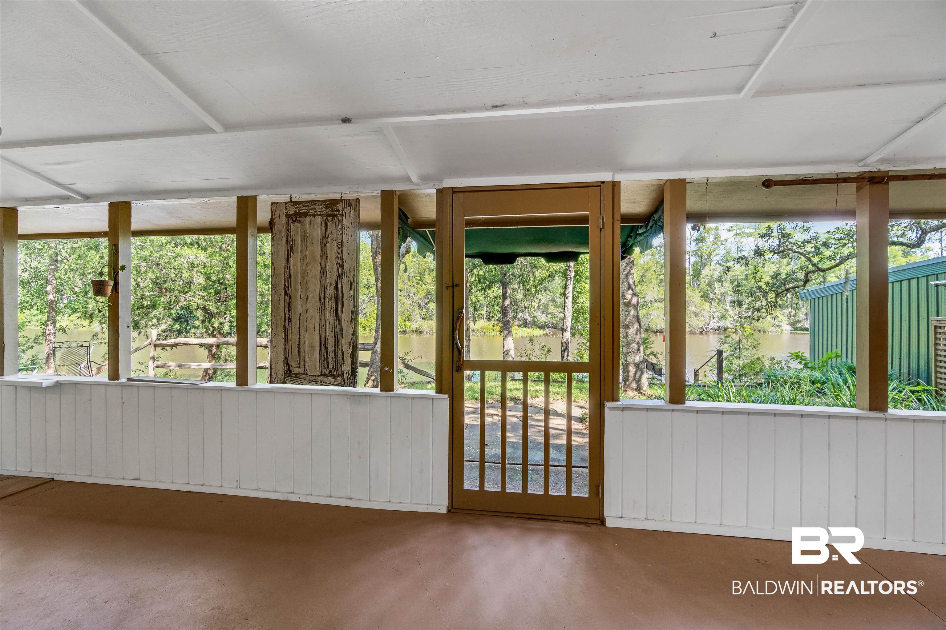 34341 Lost River Road Seminole, AL 36574 - Photo 24 of 36 View of unfurnished sunroom