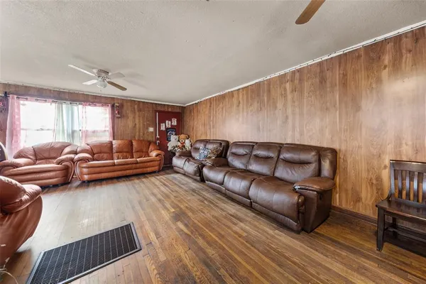 a living room with furniture and a couch