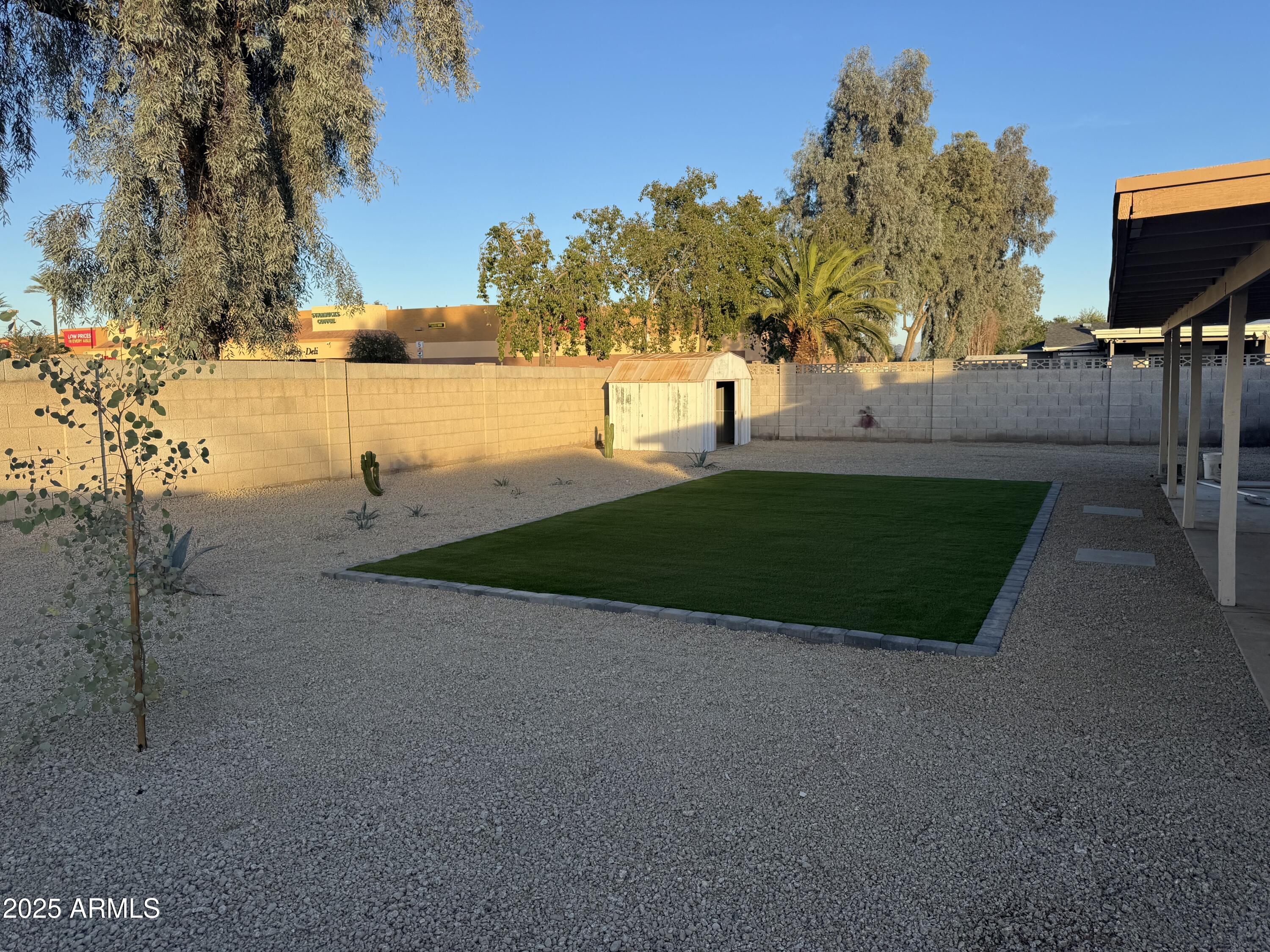 4016 East Eugie Avenue Phoenix, AZ 85032 - Photo 5 of 8 a view of a park with large trees