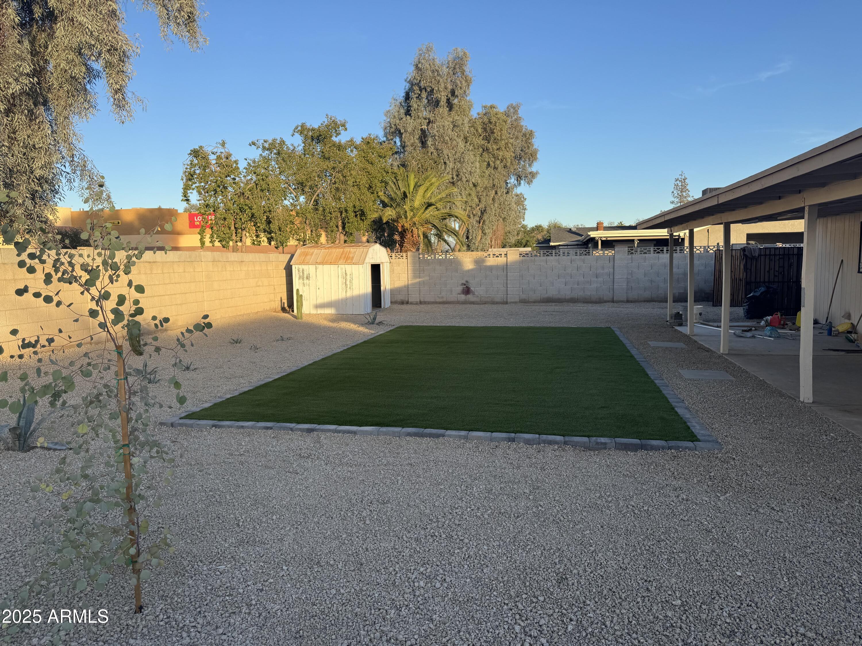 4016 East Eugie Avenue Phoenix, AZ 85032 - Photo 7 of 8 a view of backyard with green space