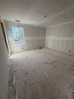an empty room with windows