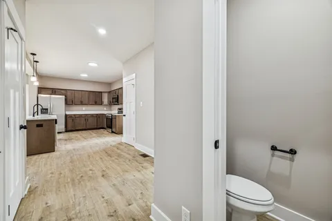 a bathroom with a sink and toilet