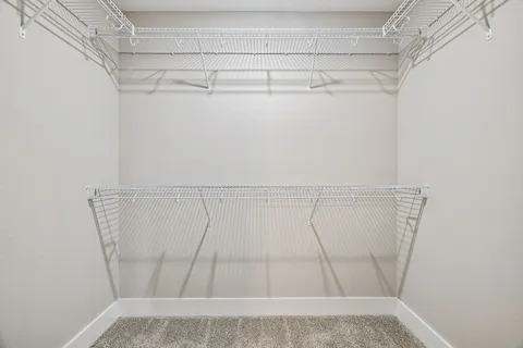 a view of a room with racks on the wall