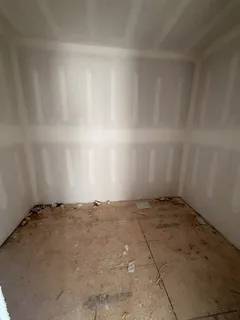 an empty room with windows