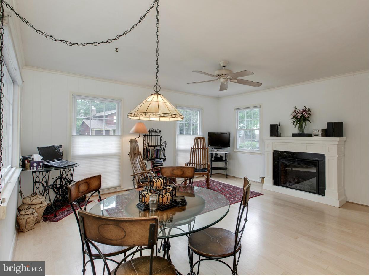 6115 Roxbury Avenue Springfield, VA 22152 - Photo 10 of 24 "Sunroom" off Kitchen with fireplace