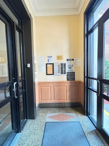 a view of a kitchen with a refrigerator