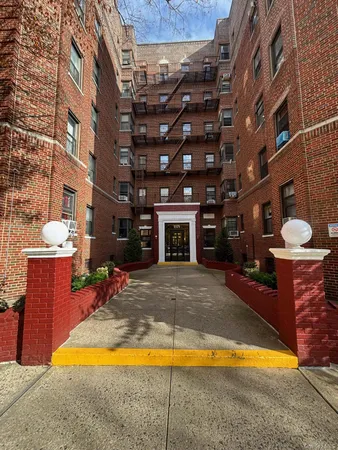 a view of a backyard with a table and chairs
