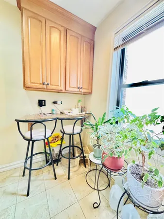 a room with a table and chairs