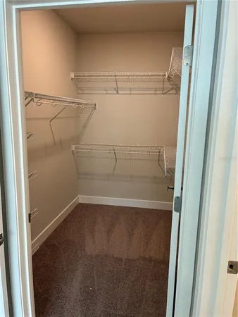 a view of a room with racks on the wall