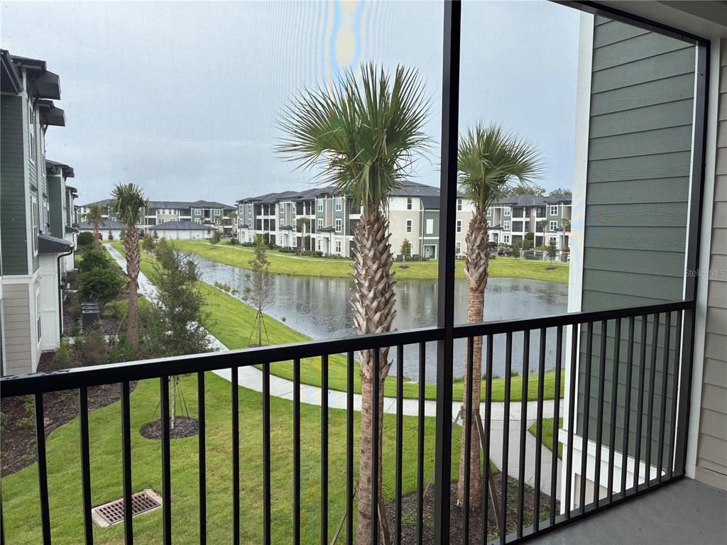 2115 Waterfall Ct Mount, Unit 8211 Mount Dora, FL 32757 - Photo 16 of 21 a view of balcony with outdoor seating