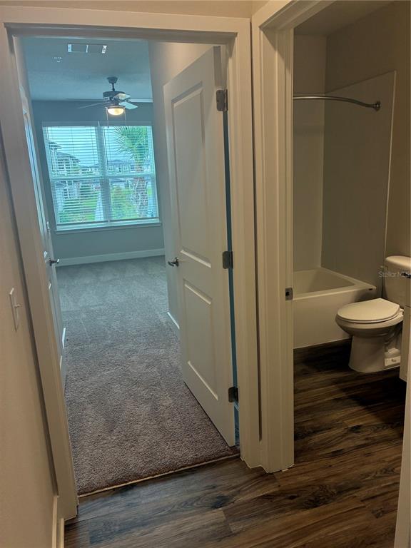 2115 Waterfall Ct Mount, Unit 8211 Mount Dora, FL 32757 - Photo 2 of 21 a bathroom with a sink and a toilet