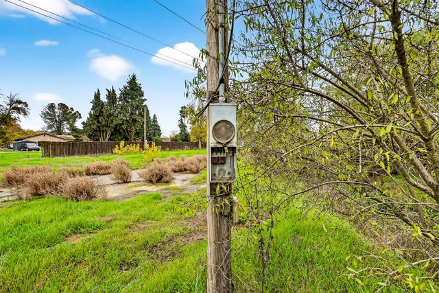 a view of a golf course with a lake view