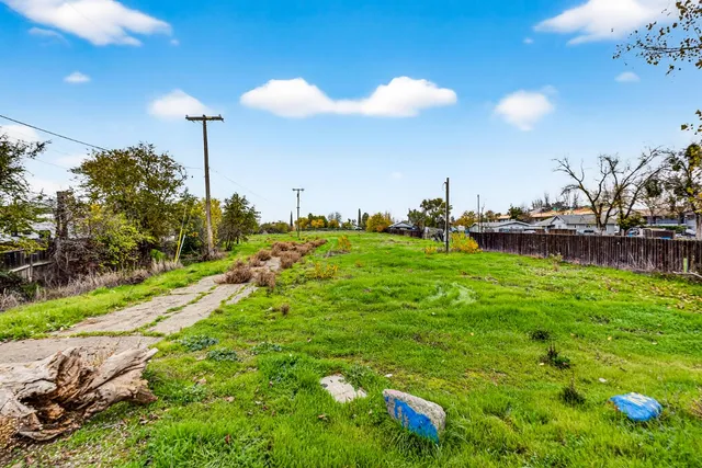 a view of a golf course with a lake view