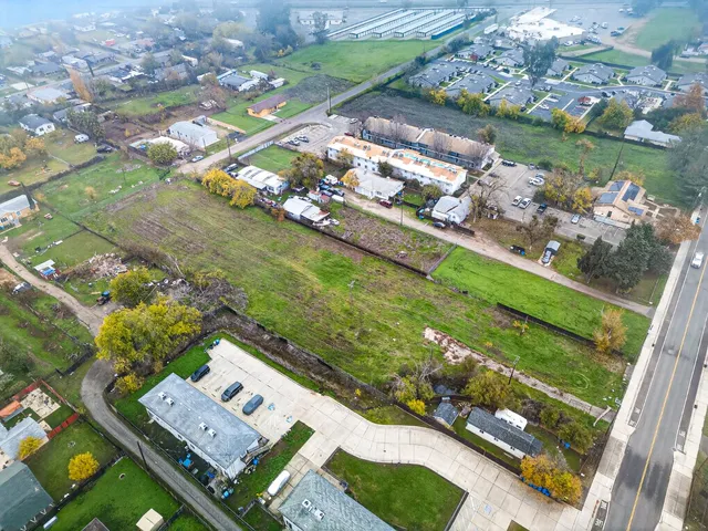 a view of a city street from a balcony
