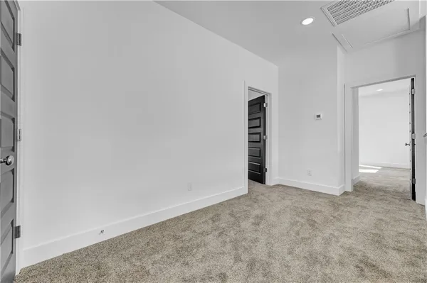 an empty room with an entryway