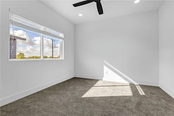 an empty room with windows