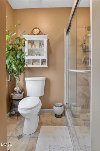 an aerial view of a house with a trees