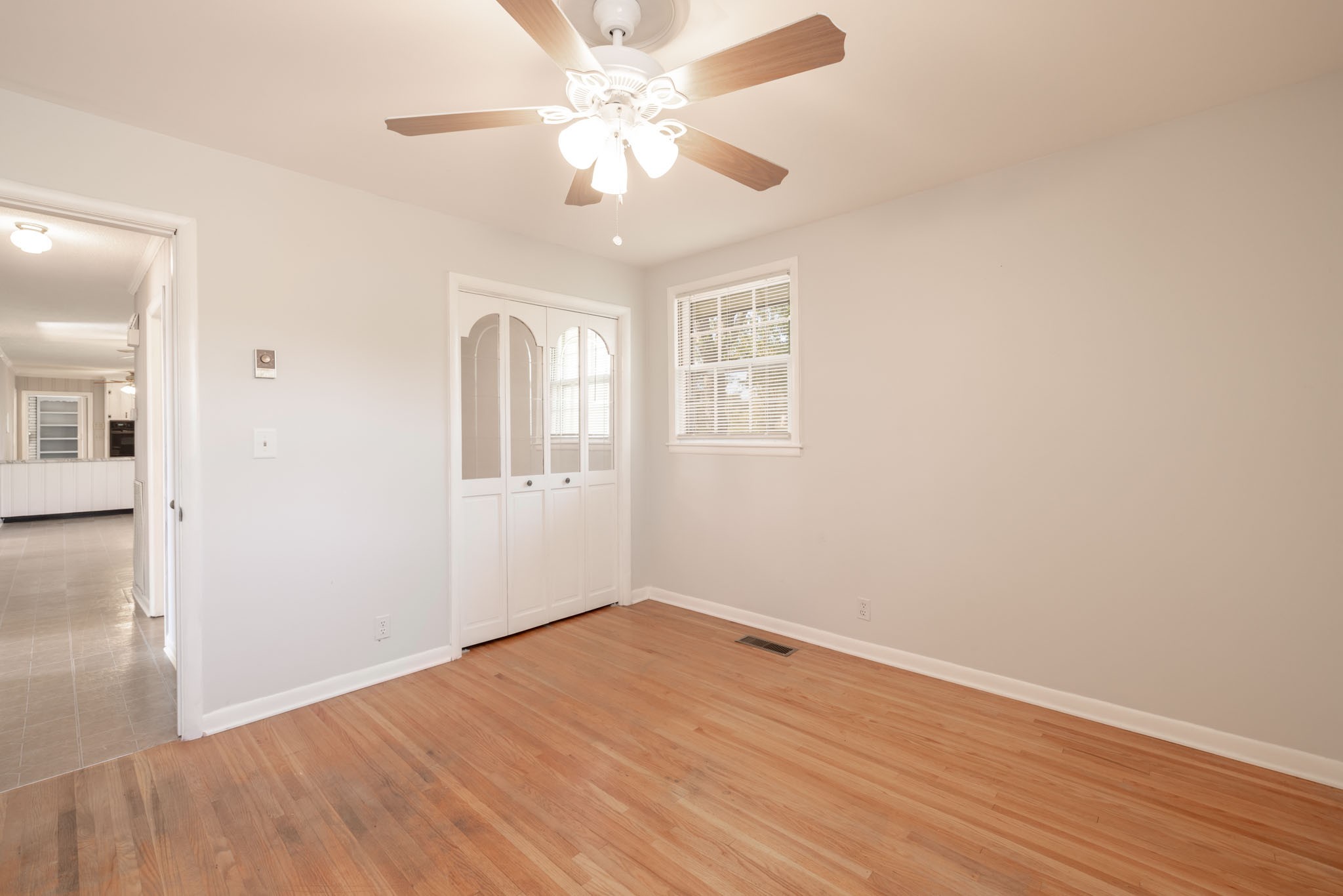 1015 Lockertsville Road Ashland City, TN 37015 - Photo 40 of 72 wooden floor in an empty room with a window