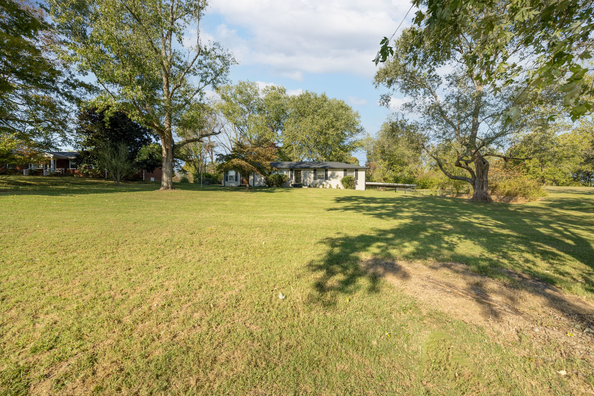 1015 Lockertsville Road Ashland City, TN 37015 - Photo 4 of 72 a view of yard with swimming pool and trees