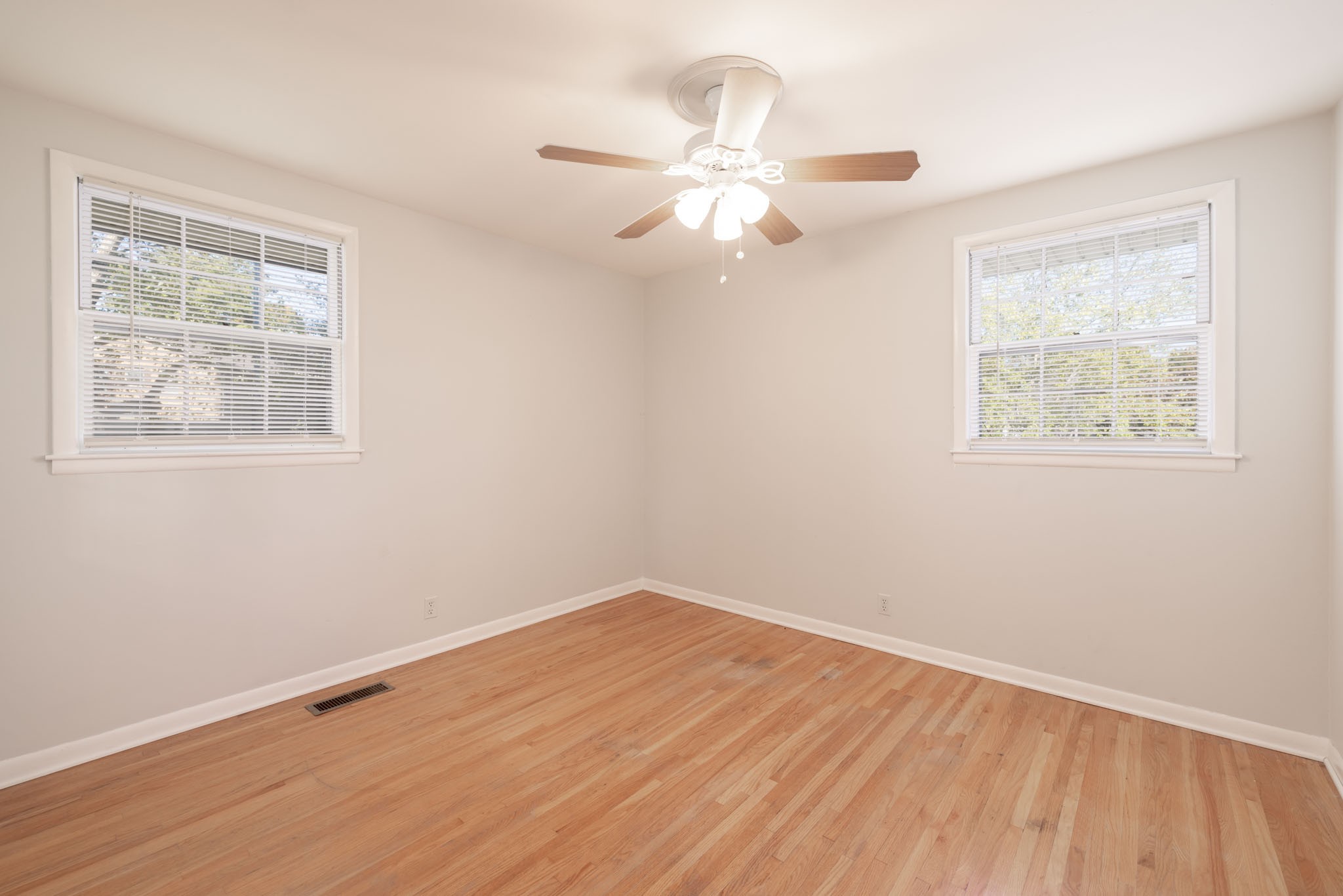 1015 Lockertsville Road Ashland City, TN 37015 - Photo 41 of 72 a view of an empty room with wooden floor and a window