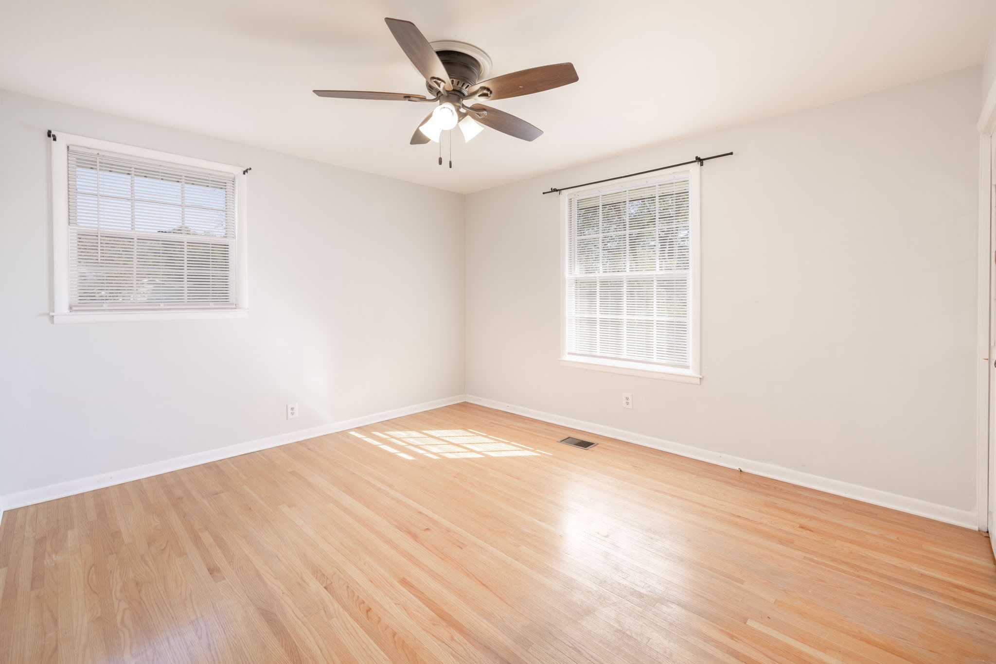 1015 Lockertsville Road Ashland City, TN 37015 - Photo 45 of 72 wooden floor in an empty room with a window