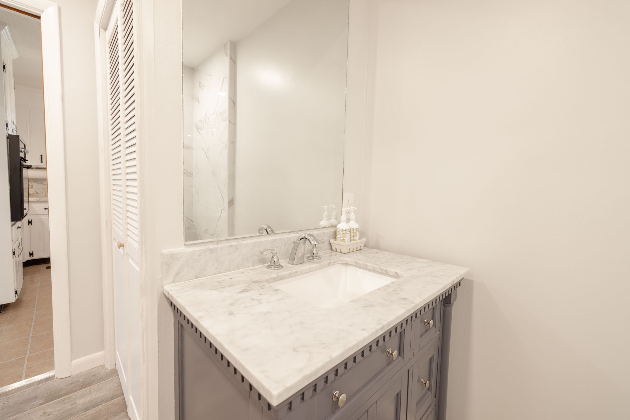 1015 Lockertsville Road Ashland City, TN 37015 - Photo 57 of 72 a bathroom with a sink and a mirror