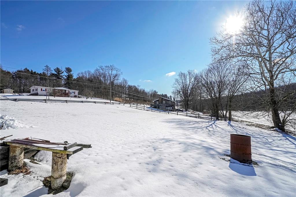 655 Joffre Cherry Valley Road Burgettstown, PA 15021 - Photo 3 of 25 a view of a backyard of snow