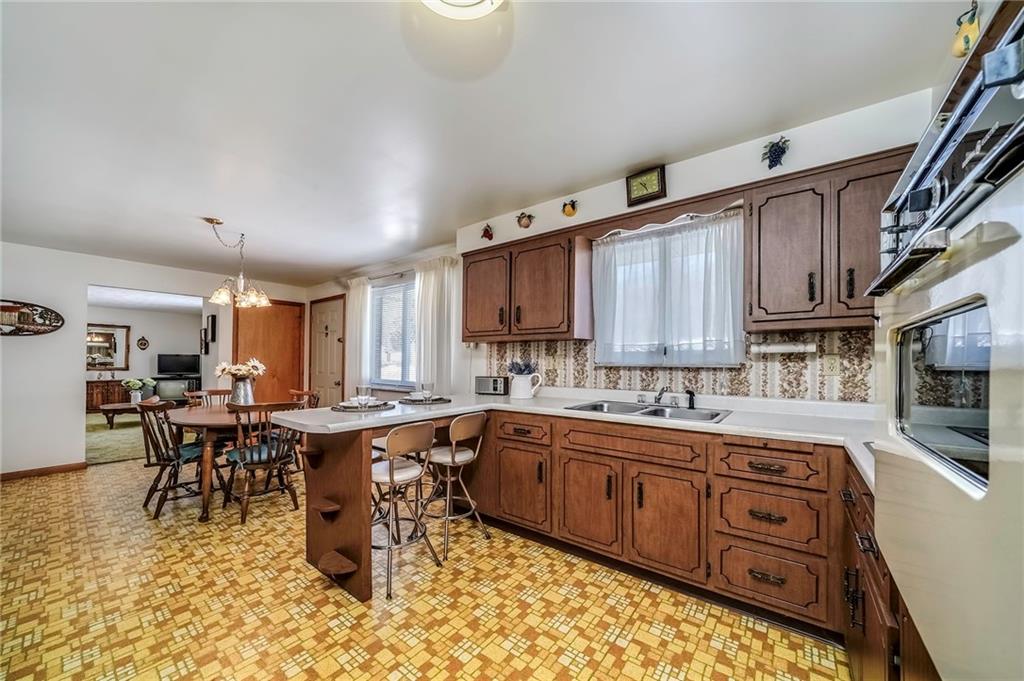 655 Joffre Cherry Valley Road Burgettstown, PA 15021 - Photo 5 of 25 a kitchen with lots of counter top space and dining table