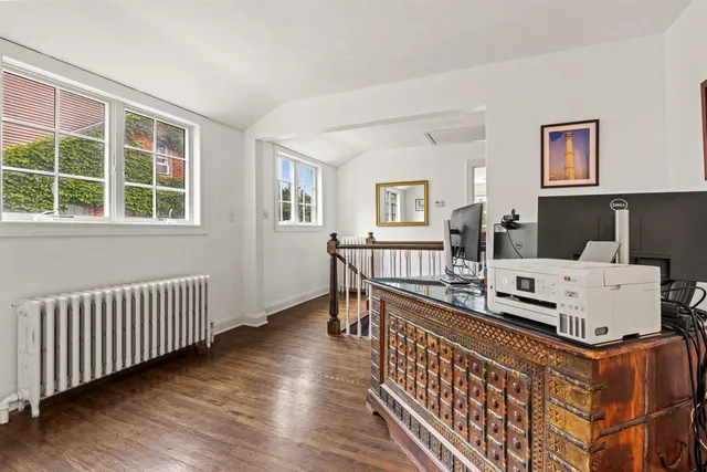 a living room with furniture and windows