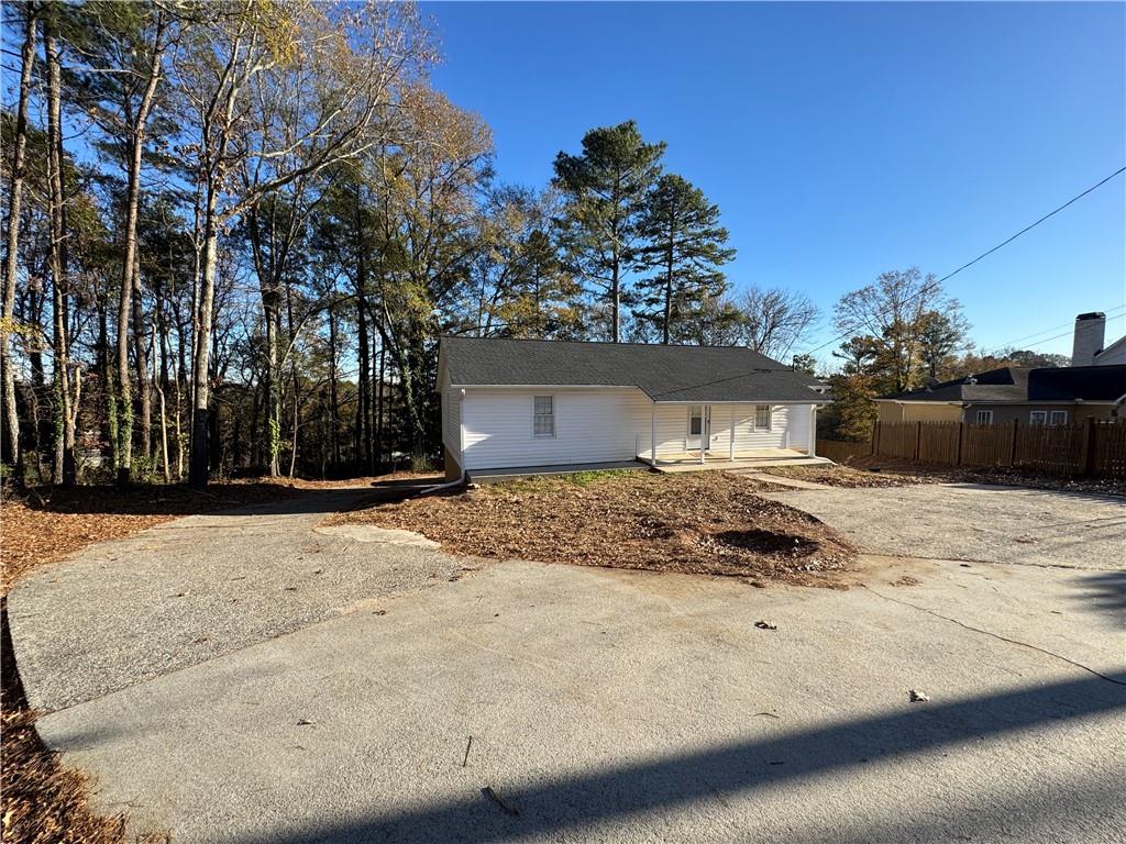 3599 Ridge Road Southeast Smyrna, GA 30080 - Photo 1 of 27 a front view of a house with a yard
