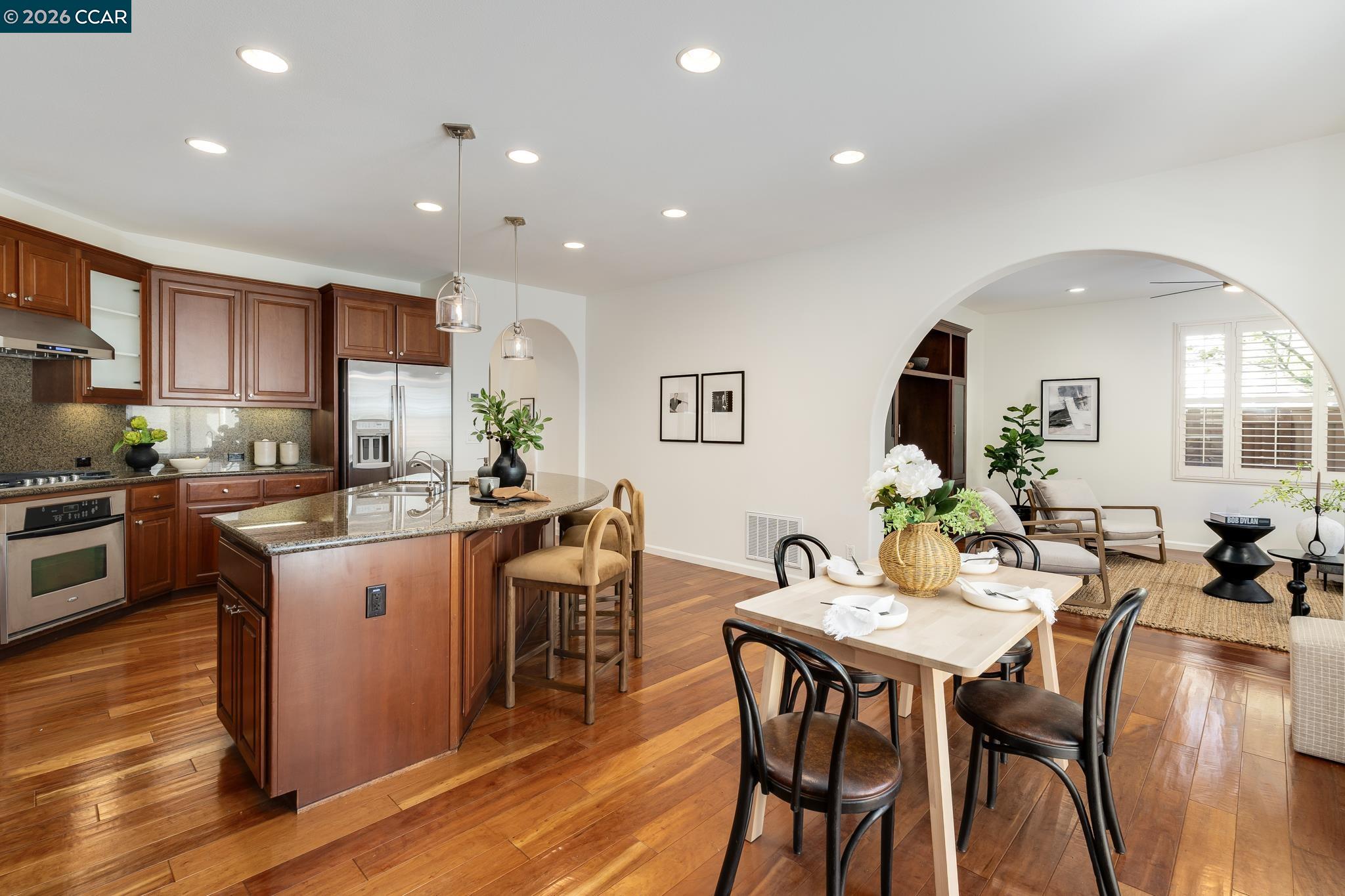 2359 Magnolia Bridge Drive San Ramon, CA 94582 - Photo 11 of 44 a kitchen with a table and chairs in it