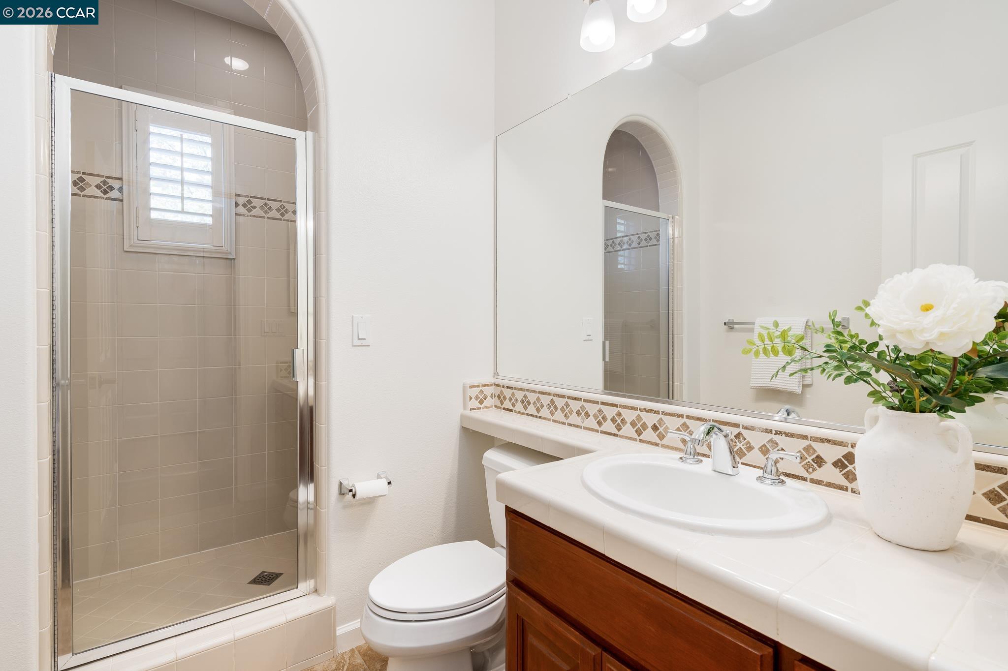 2359 Magnolia Bridge Drive San Ramon, CA 94582 - Photo 17 of 44 a bathroom with a sink and a mirror