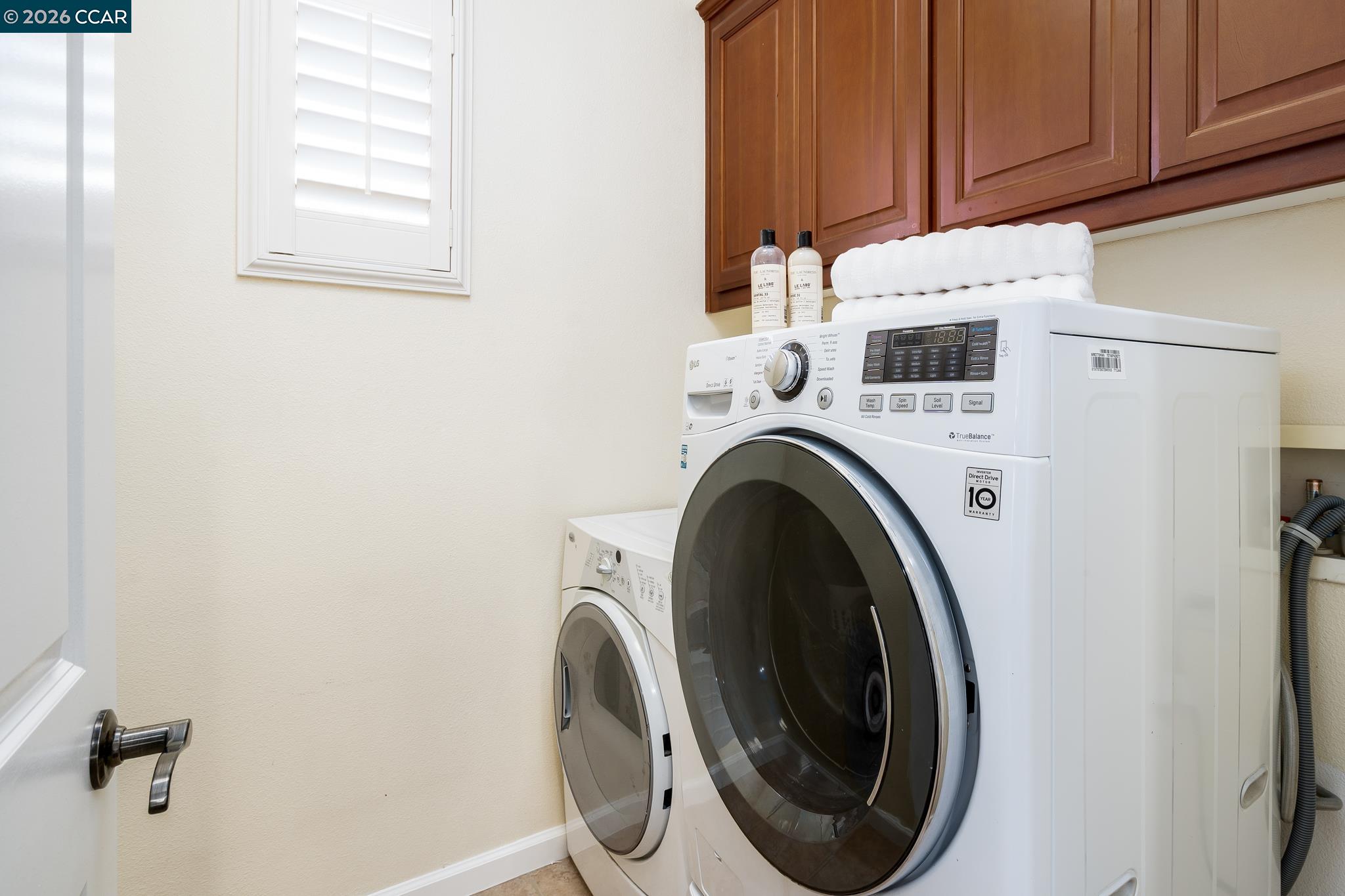 2359 Magnolia Bridge Drive San Ramon, CA 94582 - Photo 26 of 44 a utility room with dryer and washer