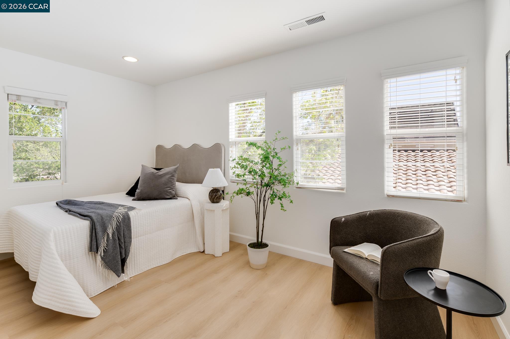 2359 Magnolia Bridge Drive San Ramon, CA 94582 - Photo 35 of 44 a bedroom with a bed and a couch