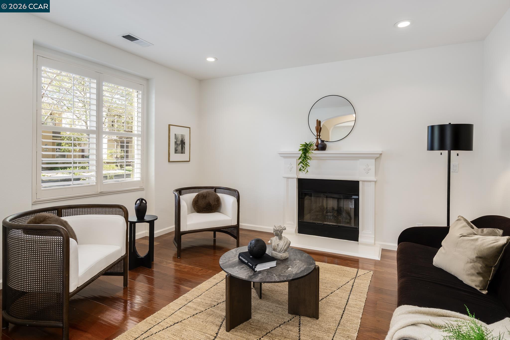 2359 Magnolia Bridge Drive San Ramon, CA 94582 - Photo 4 of 44 a living room with furniture and a fireplace