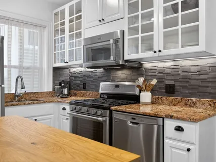 $575,000 | 106 Sawyer Avenue, Unit 1, Boston, MA 02125