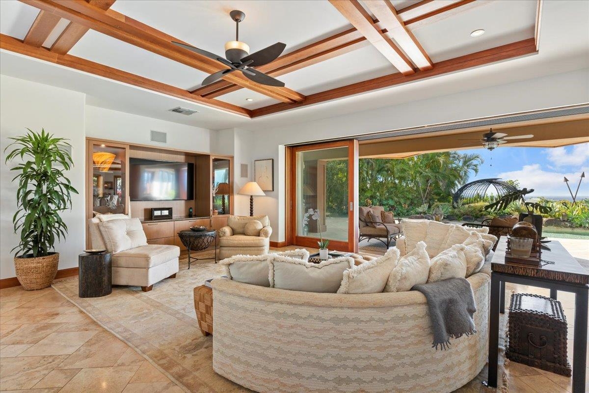 238 Crestview Road Lahaina, HI 96761 - Photo 11 of 48 a living room with furniture and a large window