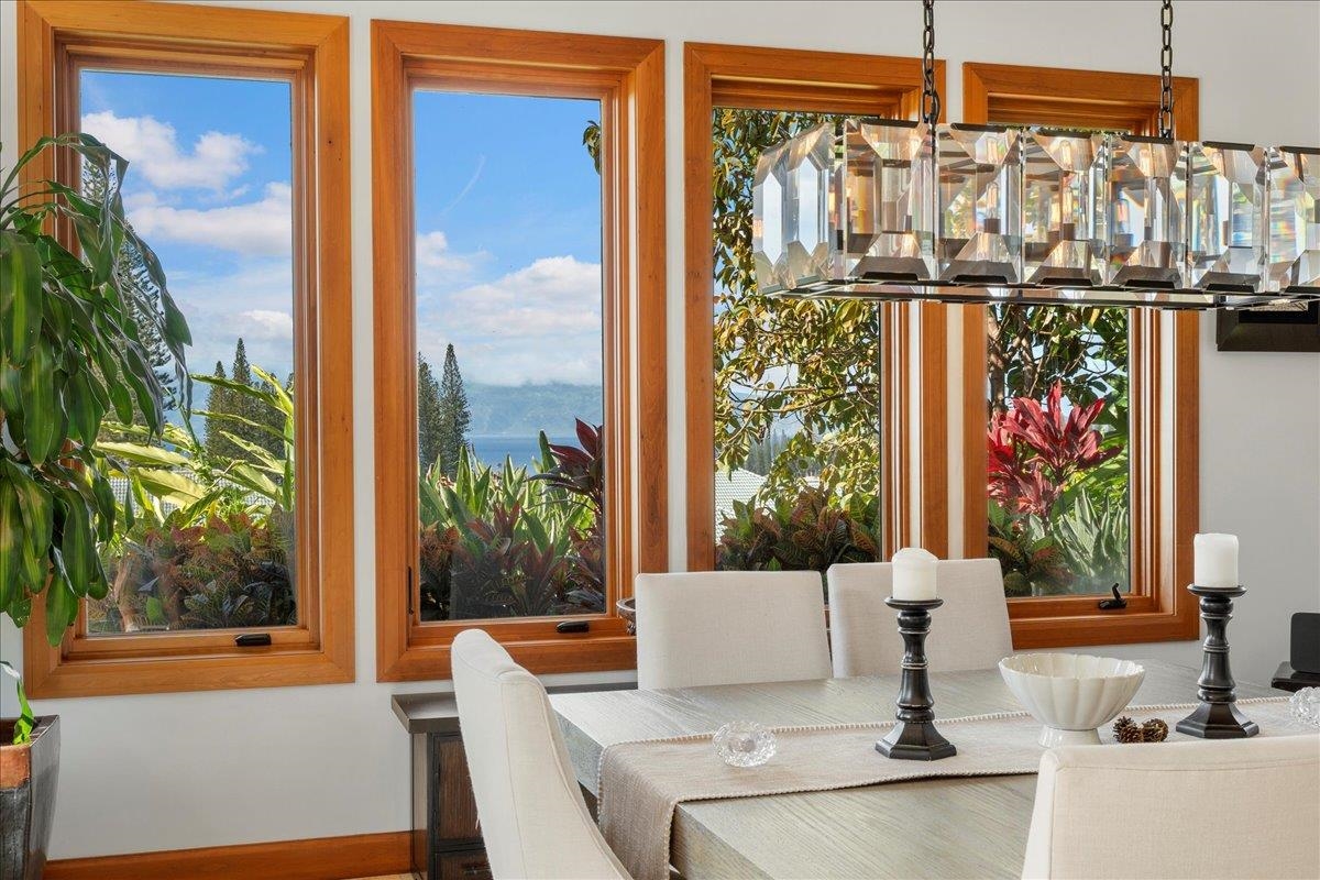 238 Crestview Road Lahaina, HI 96761 - Photo 12 of 48 a view of an outdoor dining space with a table and chairs