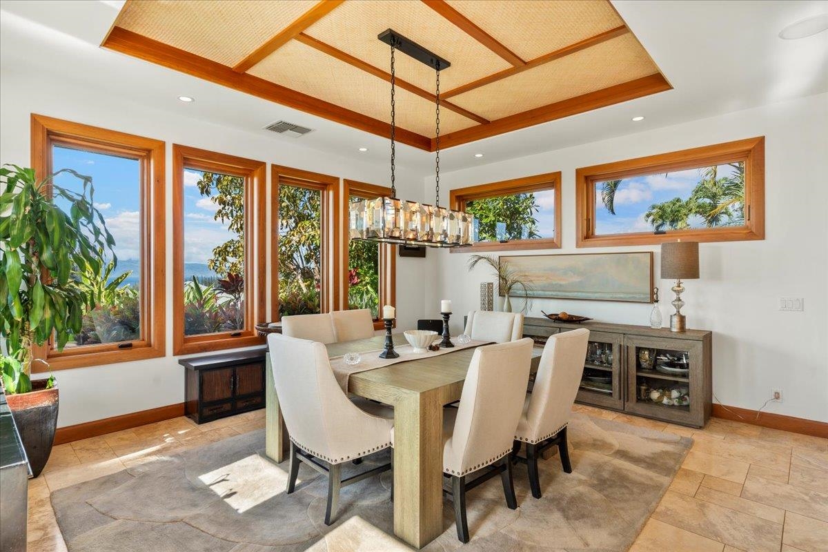 238 Crestview Road Lahaina, HI 96761 - Photo 19 of 48 a dining room with furniture a flat screen tv and outdoor view