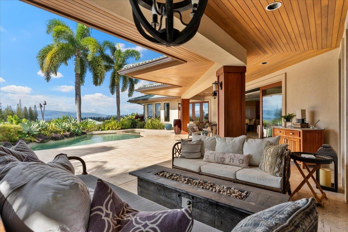 238 Crestview Road Lahaina, HI 96761 - Photo 20 of 48 a view of a patio with couches and chairs
