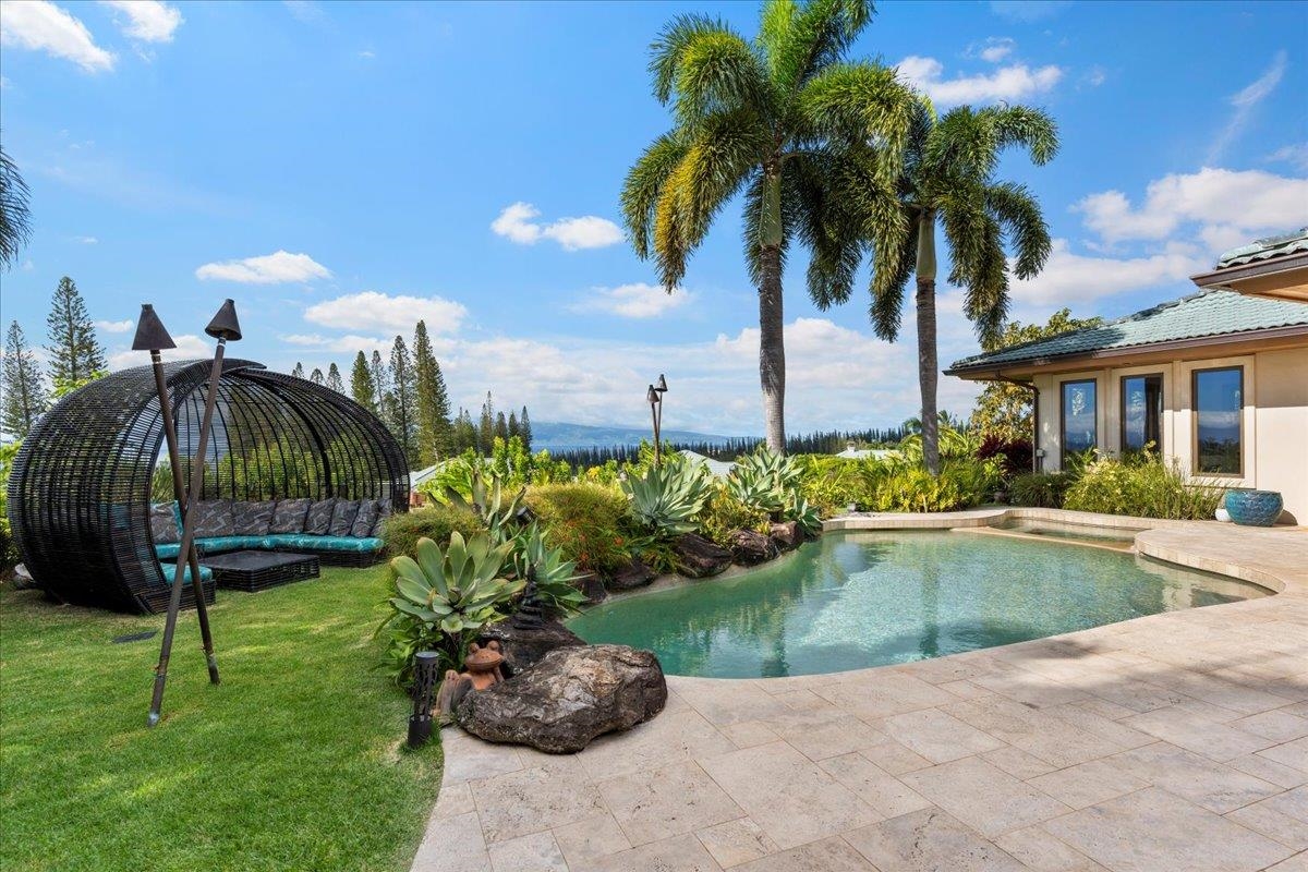 238 Crestview Road Lahaina, HI 96761 - Photo 21 of 48 a front view of multi story residential apartment building with yard and green space