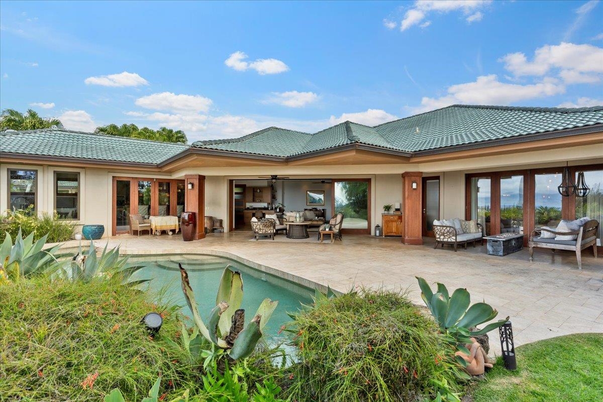 238 Crestview Road Lahaina, HI 96761 - Photo 24 of 48 a view of a house with swimming pool and sitting area