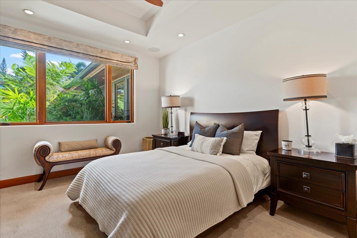 238 Crestview Road Lahaina, HI 96761 - Photo 32 of 48 a bedroom with two beds and a large window