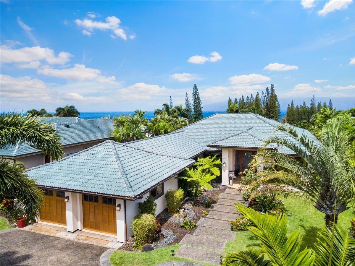 238 Crestview Road Lahaina, HI 96761 - Photo 42 of 48 a aerial view of a house with yard and garden