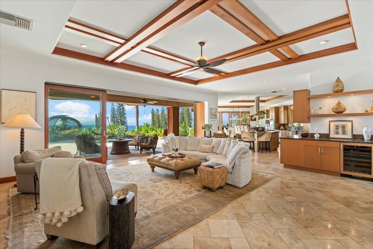 238 Crestview Road Lahaina, HI 96761 - Photo 10 of 48 a living room with furniture and a large window