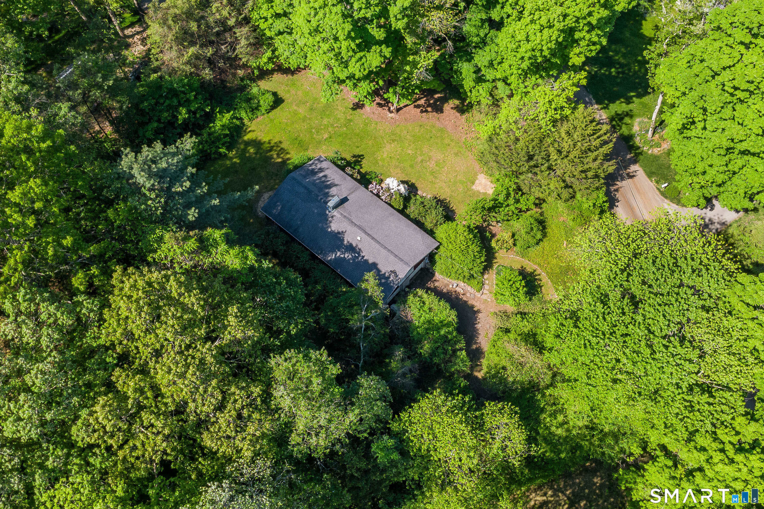 4 Pepper Pond Road Sherman, CT 06784 - Photo 33 of 33 an aerial view of a house with a yard
