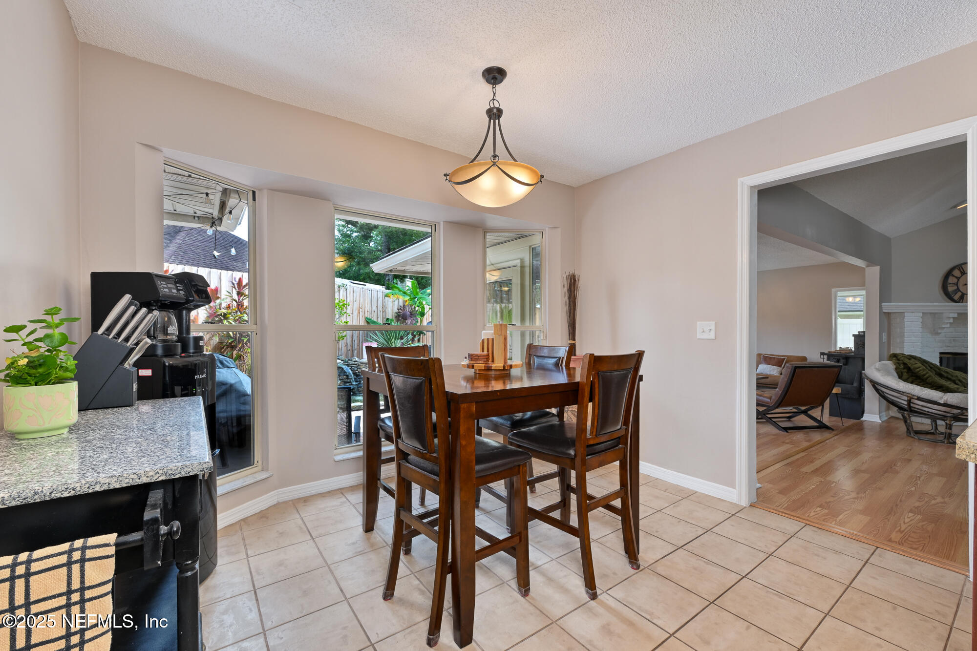 10905 Brentfield Road Jacksonville, FL 32225 - Photo 13 of 36 a view of a dining room with furniture