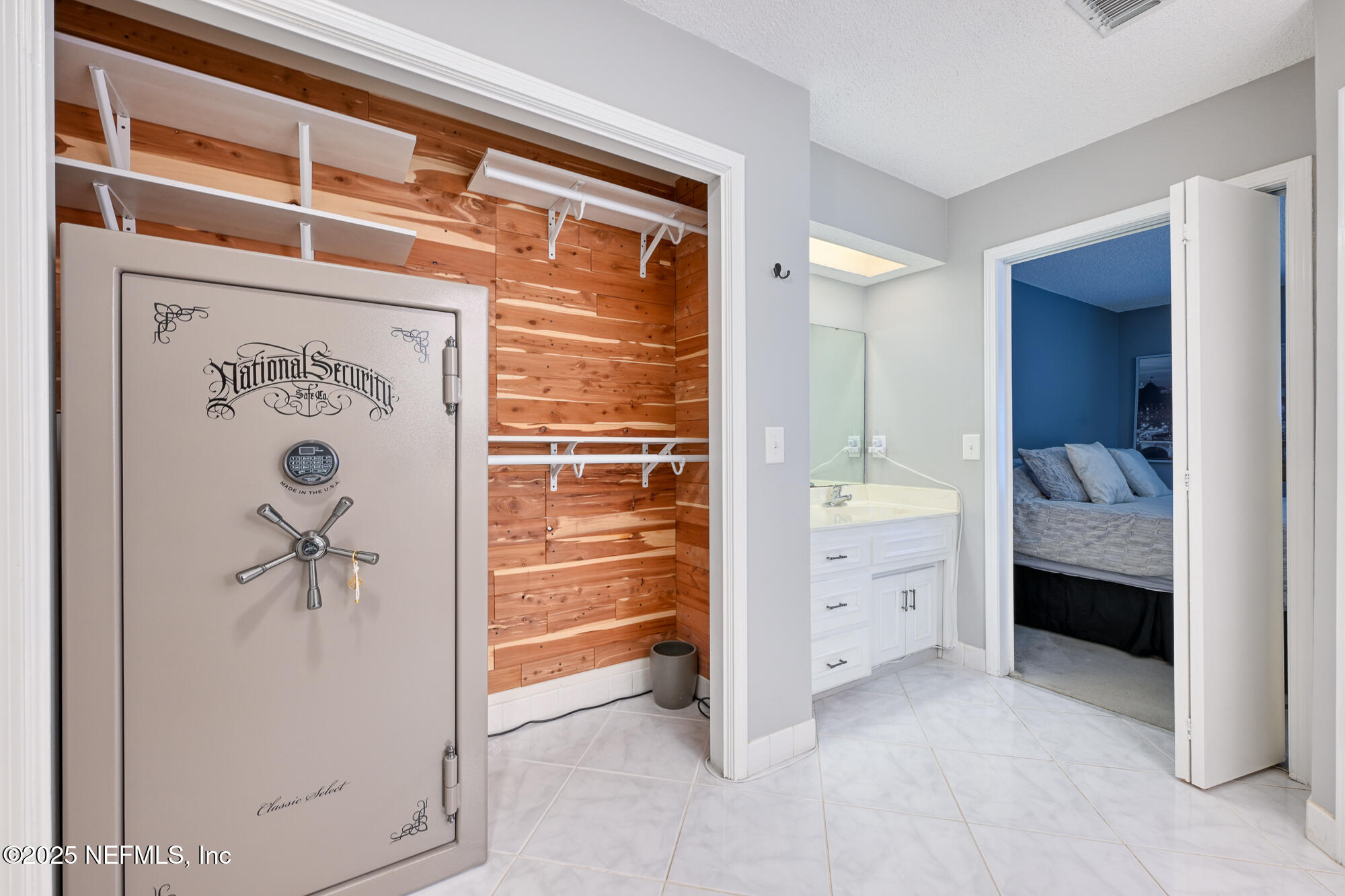 10905 Brentfield Road Jacksonville, FL 32225 - Photo 21 of 36 a bathroom with a shower and a sink