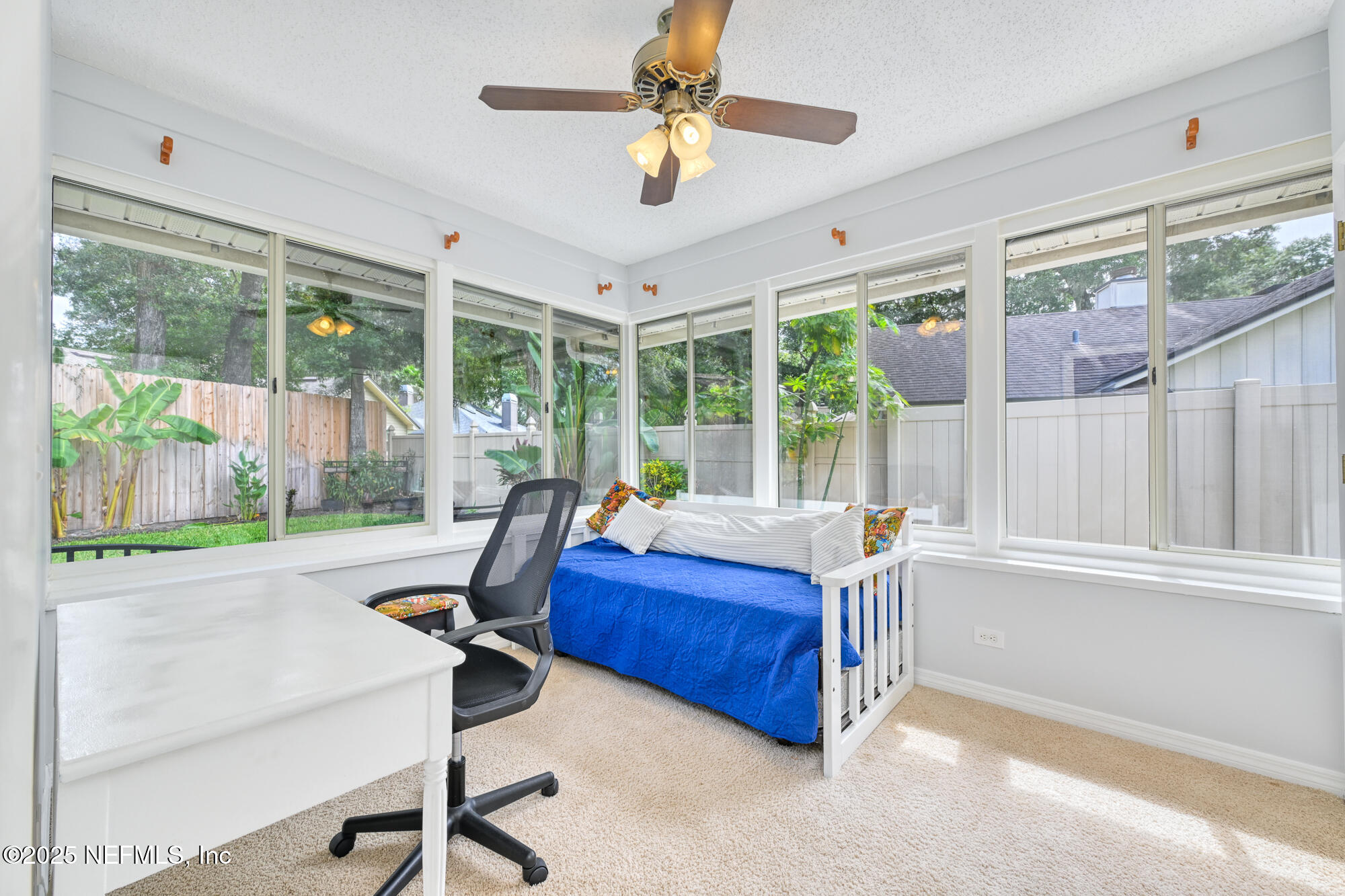 10905 Brentfield Road Jacksonville, FL 32225 - Photo 25 of 36 a view of a room with gym equipment