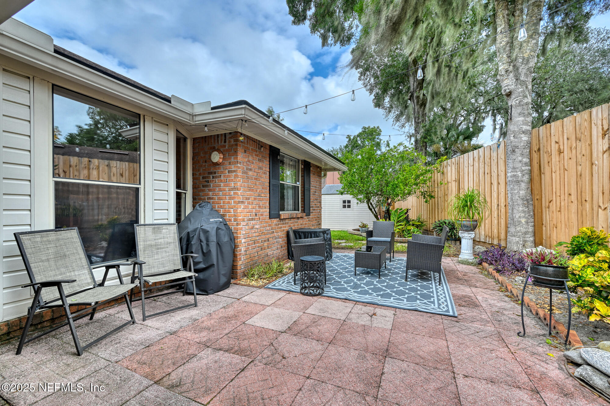 10905 Brentfield Road Jacksonville, FL 32225 - Photo 30 of 36 a view of a patio with couple of chairs